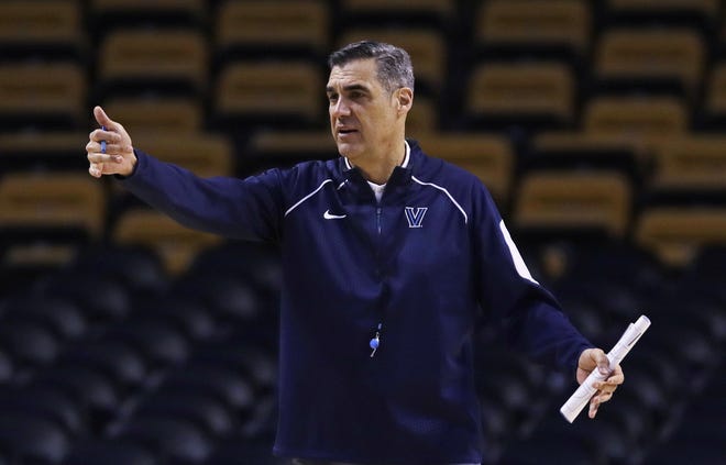 Villanova head coach Jay Wright calls to his players during practice at TD Garden on Thursday as the top-seeded Wildcats prepare to play No. 5 West Vrginia on Friday in the East Regional semifinals in Boston.