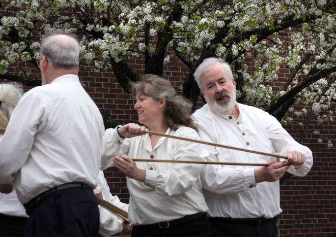 The New England Folk Festival will return to Mansfield at 7 p.m. April 20 at the Mansfield High School, 250 East St. The festival will continue from 10 a.m. to 11:30 p.m. April 21 and from 10 a.m. to 5:30 p.m. April 22. Above, Sarah Higginbotham and Rich Jackson of the Still River Longswords in action at last year's festival. [Wicked Local Photo/Charlene A. McNeil]