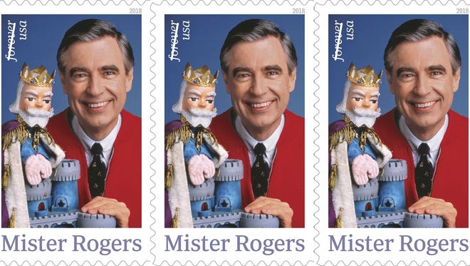 This image released by the U.S. Postal Service shows the Mister Rogers forever stamp which will go on sale on Friday, March 23. Fred Rogers, the gentle TV host who entertained and educated generations of preschoolers on “Mister Rogers’ Neighborhood," died in 2003 at age 74. (U.S. Postal Service)
