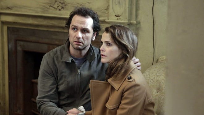 Matthew Rhys plays Philip, and Keri Russell is Elizabeth on "The Americans." Its sixth and final season starts at 10 p.m on FX. [FX PHOTO]