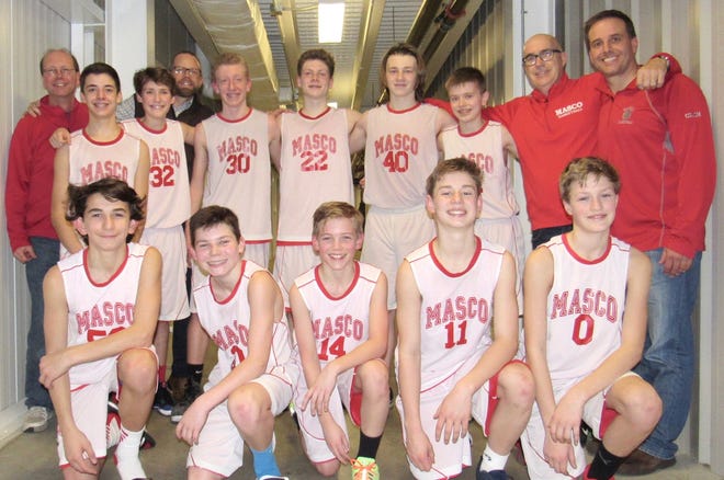 The Masco Grade 8 boys team that won the championship in the Eastern League include, from left to right, Alec Aftandilian, Tim McGinley, Sean Morrison, Aidan Gauvain and Toal Lodewick; in the back row are Coach Rob Morrison, Dylan Verlardo, Will Dempsey, Coach Brian McGinley, Marc Gaudin, Kevin Pelletier, Charlie Stark, Sam McCall, Coach Bob Dempsey and Coach Tony Verlardo. [Courtesy Photo]