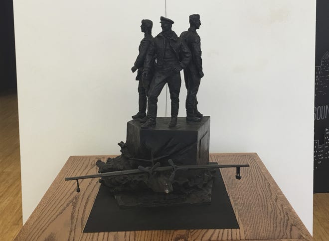 A model of the "Project Zebra" memorial stands in the Arts of the Albemarle building in Elizabeth City, N.C., on Monday, March 12, 2018. The city council initially OK'd the Russian-financed monument commemorating the World War II operation, but a new council has declined to sign a memorandum of understanding that would allow the plan to proceed. (AP Photo/Martha Waggoner)