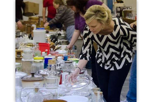 SOMETHING FOR EVERYONE — Dedicated volunteers spend weeks sorting, cleaning, pricing and placing to get ready for the Randolph Arts Guild Rummage Sale. (Contributed)