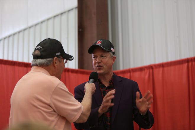 Congressman Roger Marshall (R-Kan.) speaks with 3i Show President Eddie Estes before answering questions at a legislative town hall during the 64th annual 3i Show in Dodge City. [CHANCE HOENER/HUTCHNEWS]