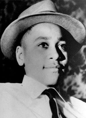 This undated photo shows Emmett Louis Till, a black 14-year-old Chicago boy, who was kidnapped, tortured and murdered in 1955 after he allegedly whistled at a white woman in Mississippi. Photos of his tortured body propelled the civil rights effort and is the subject of an NBC documentary "Hope & Fury." (AP Photo, File)