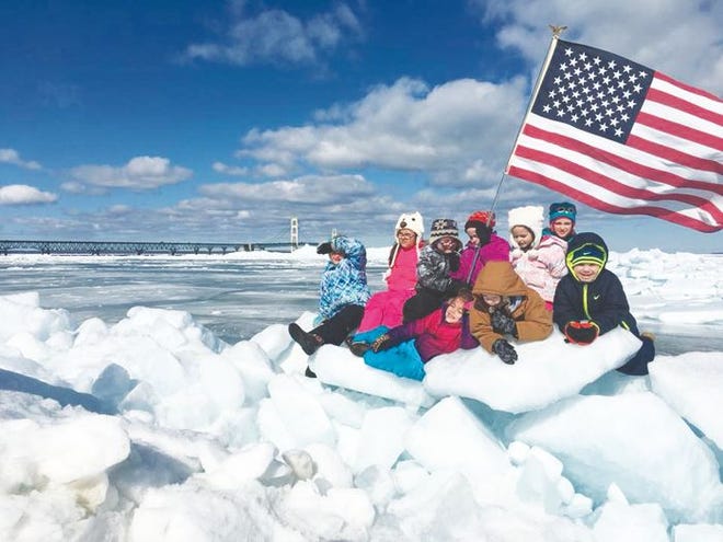 Students from Bishop Baraga Catholic School's first grade class, taught by Jennifer Scheele, took a trip to Mackinaw City to see the blue ice formations.