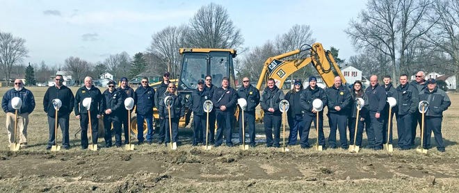 Firefighters and trustees of the Town & Country Fire District joined representatives from Imhoff Construction Services to break ground on a new fire station in West Salem.