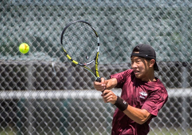 FRED ZWICKY/JOURNAL STAR FILE PHOTO

David Wu competes in the Tri-County Tennis tournament last summer at Glen Oak Park in Peoria.
