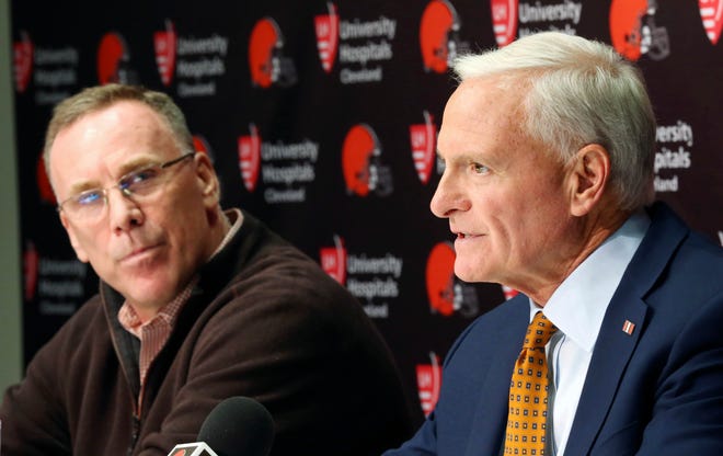 Cleveland Browns owner Jimmy Haslam, right, introduces the NFL football teams new general manager, John Dorsey, left, during an introductory press conference in Berea, Ohio, Friday, Dec. 8, 2017. (John Kuntz/The Plain Dealer via AP)