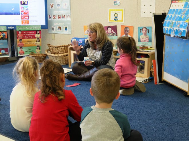 Teacher Jane Anglin leads a class at the Enoch Cobb Early Learning Center. (BP photo by Susan Vaughn)