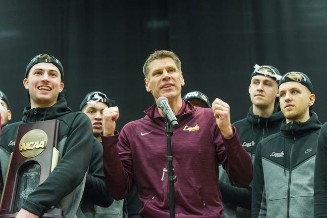 Loyola coach Porter Moser addresses fans at a rally inside the Gentile Arena on Sunday. The Ramblers, who hadn't been on the national radar in decades, are the darlings of the Final Four. [Tyler LaRiviere/Chicago Sun-Times via AP]