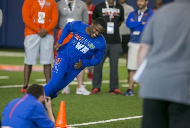 Wide receiver Antonio Callaway sprints during an agility drill at Florida's Pro Day Wednesday in Gainesville. [Alan Youngblood / Gatehouse Media]