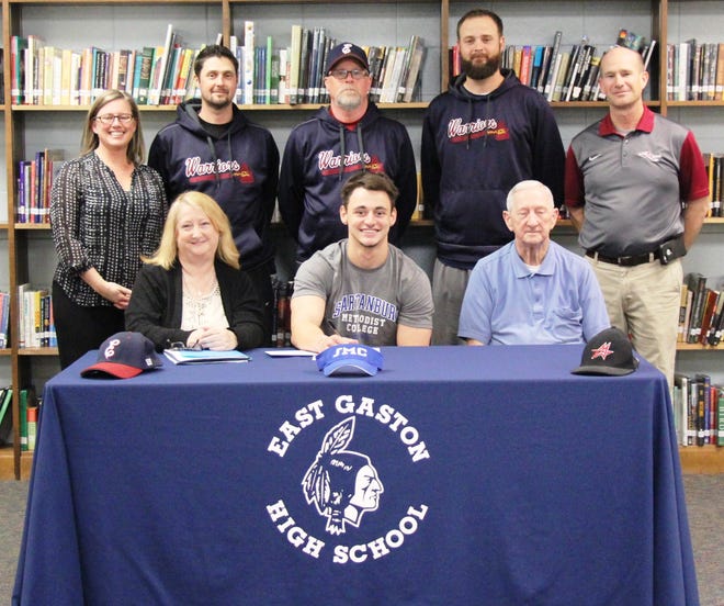 East Gaston's Dosi Jonas has signed to play baseball at Spartanburg-Methodist College. Pictured on the front row, from left, are mother Donna Jonas, Dosi Jonas, grandfather Bud Jonas; back row, from left, are East Gaston principal Jennifer Reep, East Gaston JV coach Kenneth Pasour, East Gaston head coach Randy Sellers, East Gaston assistant coach Ryan Resendez and East Gaston athletic director Tom Adams. [Special to The Gaston Gazette]