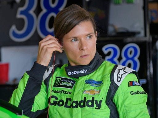 FILE - This Feb. 17, 2018, file photo shows Danica Patrick preparing to practice for the NASCAR Daytona 500 Cup Series auto race at Daytona International Speedway in Daytona Beach, Fla. Patrick returned to Indianapolis Motor Speedway this week expecting to drive an Indy car for the first time since 2011. Weather prevented her from turning any laps. Patrick is the only woman to win an IndyCar race, lead laps in both the Indianapolis 500 and the Daytona 500, win the pole for the Daytona 500, and the highest-finishing woman in both iconic races. She left the IndyCar Series after the 2011 finale for a full-time move to NASCAR, but is closing her storied career at the track most associated with her historic moments. (AP Photo/Phelan M. Ebenhack, F162ile)