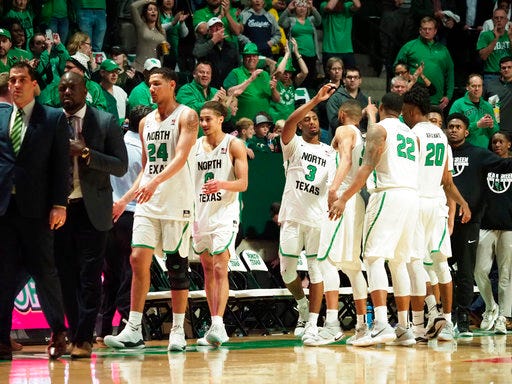 North Texas celebrates after defeating San Francisco in the second game of the College Basketball Invitational final series Wednesday, March 28, 2018, in Denton, Texas. (Jeff Woo/The Denton Record-Chronicle via AP)