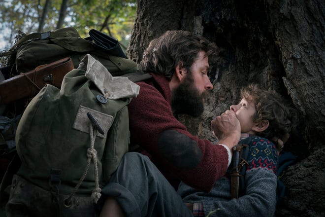 Director/star John Krasinski tries to calm down a frightened Noah Jupe. [Paramount Pictures]