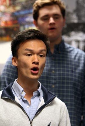 South Point High School senior Charlie Tran takes part in chorus practice Wednesday. He is a winner of the prestigious Morehead-Cain Scholarship to UNC Chapel Hill. [Mike Hensdill/The Gaston Gazette]