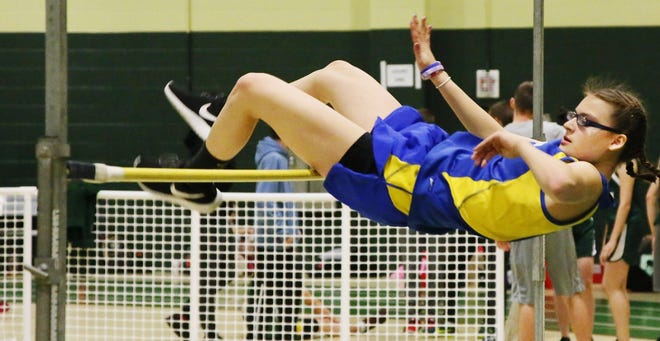 Wareham's Taylor Gerbig clears the bar in the high jump. [MIKE VALERI/THE STANDARD-TIMES/SCMG]