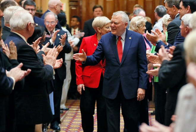 Georgia Gov. Nathan Deal and first lady Sandra Deal are greeted with a standing ovation as they enter the House where Deal addressed them for his last Sine Die. Thursday, March 29, 2018, was the 40th and final day of the 2018 General Assembly. (Bob Andres/Atlanta Journal-Constitution via AP)