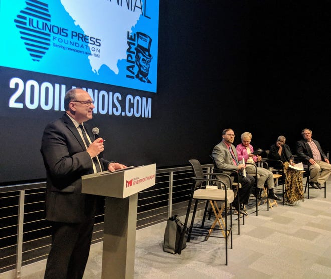 Executive editor Dennis Anderson introduces the panel during a discussion hosted by the Journal Star and the Peoria Riverfront Museum on "Peorians Who Changed the World."