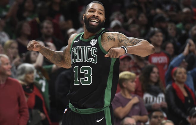 Despite playing without starters like forward Marcus Morris, shown reacting in game against the Trail Blazers on March 23, the Celtics are within striking distance of the top seed in the Eastern Conference. [AP Photo/Steve Dykes]