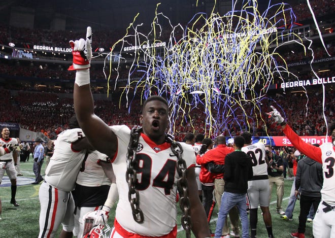 University of GeorgiaþÄôs Michael Barnett celebrates after the win against Auburn in the SEC championship game in Atlanta on Saturday, December 2, 2017 (photo by Matthew Caldwell)
