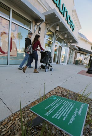 Shoppers at the Pavillion in Port Orange pay a 1 percent infrastructure fee that's used to help maintain the property. Such fees are a relatively new trend with apparently only a handful around the state — though 3 have popped up in Volusia County this decade. Critics say they give deep-pocketed developers an unfair advantage over traditional businesses that don't get the fees or special tax breaks. [News-Journal/Nigel Cook]