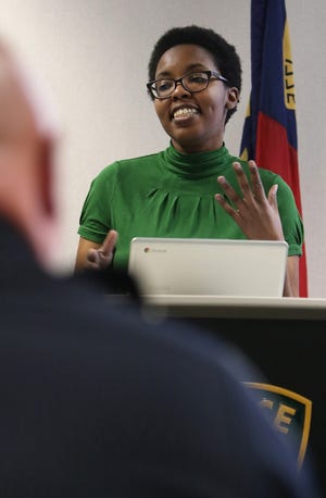 Crystal Byrd Farmer talks about the Gastonia Freedom School, a new private school which intends to serve low-income and special needs children, during an informational session held Tuesday evening, March 27, 2018, in the community room at the Gaston County Police Department on West Franklin Boulevard. [Mike Hensdill/The Gaston Gazette]