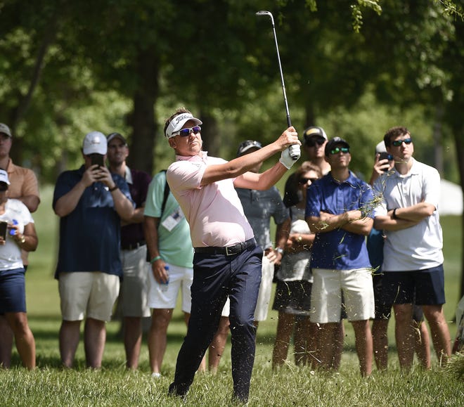 Ian Poulter hits his third shot on the 13th hole during the third round of the Houston Open golf tournament, Saturday, March 31, 2018, in Humble, Texas. (AP Photo/Eric Christian Smith)
