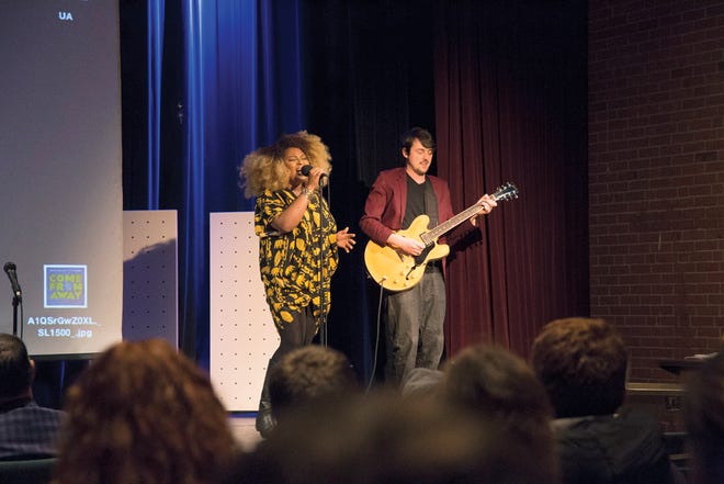 Amber Knicole and George Barrie perform at Upper Arlington High School.