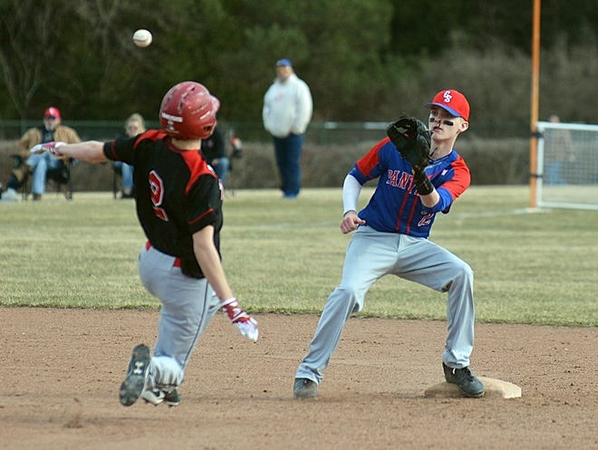 Campbell-Savona shortstop Patrick Dobson waits for the throw to catch Bolivar-Richburg baserunner Logan Bess in a rundown. [ERIC WENSEL/THE LEADER]