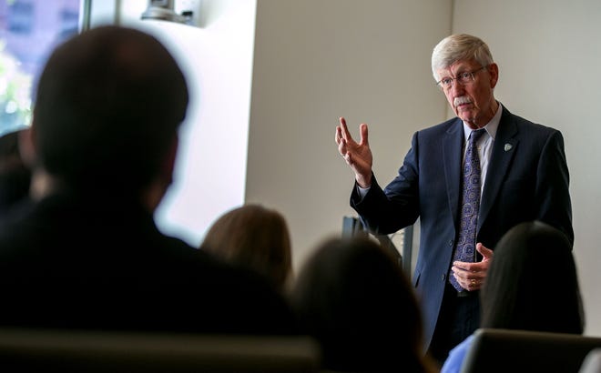 Dr. Francis Collins, Director of the National Institutes of Health, speaks to a small group of students at the Harrell Medical Education Building after his fireside chat Monday. He spoke to medical faculty and students and later with a smaller group of students. [Alan Youngblood/Staff photographer]