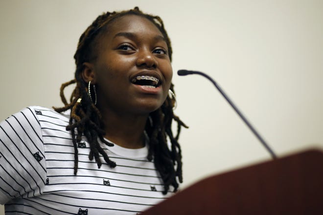 Daelynn Johnson speaks about her experience at last month's March for Our Lives rally in Washington at the Athens-Clarke County Library on Tuesday. [Joshua L. Jones/Athens Banner-Herald]