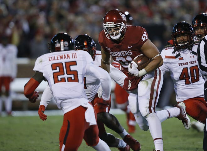 Oklahoma tight end Mark Andrews (81) runs with the football during a game against Texas Tech on Oct. 28 in Norman, Okla. [AP Photo/Sue Ogrocki]