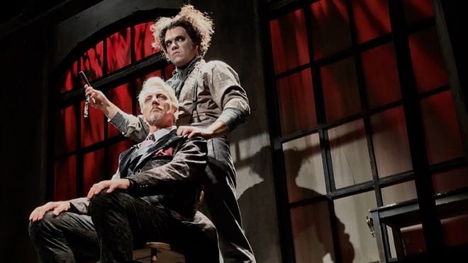 Shane Tanner (standing), portraying the homicidal barber, takes aim at Michael McKenzie (seated), who played Judge Turpin, in Palm Beach Dramaworks’ production of Sweeney Todd: The Demon Barber of Fleet Street. Tanner won the best actor in a musical award in the 2017 Carbonell Awards. Photo by Cliff Burgess