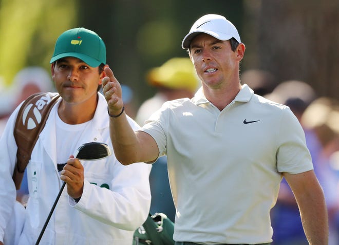 Rory McIlroy reacts to his drive on the 17th hole during his practice round at Augusta National Golf Club on Tuesday.
