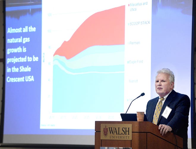 Artex Oil President Jerry James discusses the area's natural gas production during the Utica Midstream conference at Walsh University's Barrette Center.