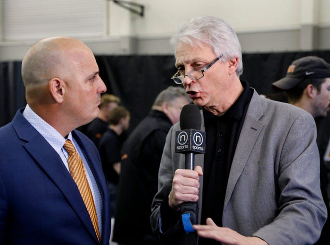 The Oklahoman's sports writer and columnist Berry Tramel interviews OSU head baseball Coach Josh Holliday at a news conference in Stillwater where Oklahoma State University sports officials announced they have begun building a new stadium for the OSU baseball program. Photo taken March 29, 2018.  Photo by Jim Beckel, The Oklahoman