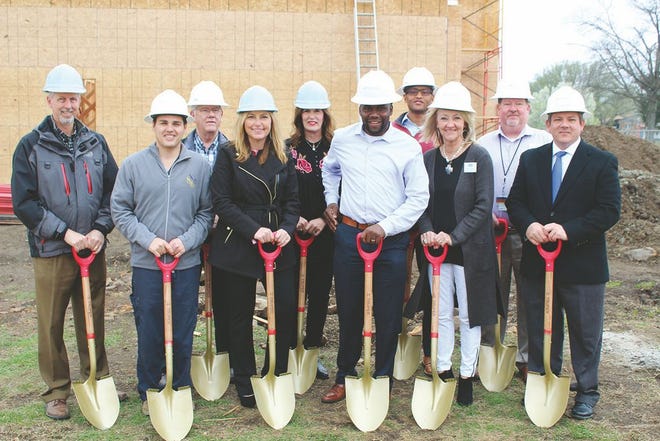 Pawhuska Hospital officials and clinic project personnel gathered March 29 for a groundbreaking ceremony. Pictured are, front from left, Dr. Cameron Rumsey, medical director; Beth Reed, board chair; Godwin Feh, hospital administrator; Cindy Tillman, hospital staff member;and Keith Horn, vice president of Rick Scott Construction. At rear, from left, are Dan Keleher, architect; Ben West, hospital board member; Beverly Tolson, board member; Jamal Bandeh, of Cohesive Healthcare; and Jason McBride, assistant hospital administrator. Not pictured is MaKenzie Prator, of the Bank of Pawhuska.