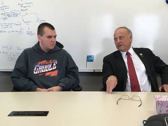 Congressman Steve King, right, shares his experiences with EDGE students like Jessiah Taylor, left. Photo by Gena Johnson/News-Republican
