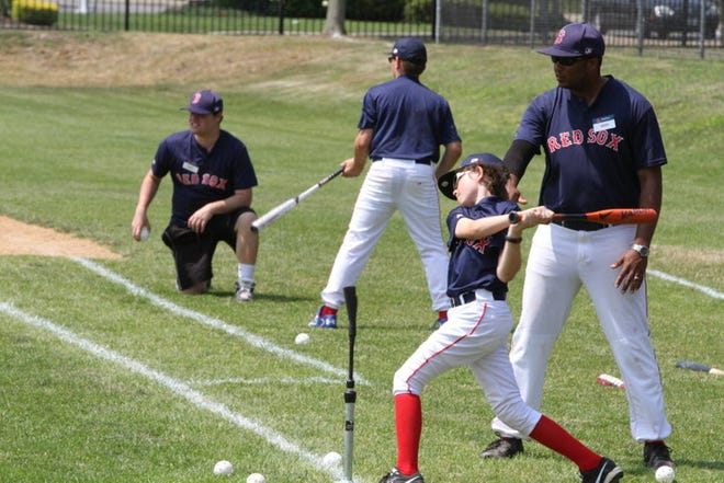 The Boston Red Sox will hold a baseball camp in July at the Providence Country Day School in East Providence. [The Providence Journal, file / Sandor Bodo]