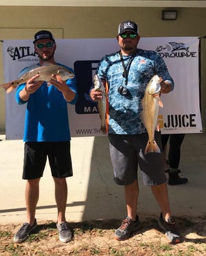 Jake and AJ Watson are shown at the Emerald Coast Redfish Circuit tournament weigh-in. [CONTRIBUTED PHOTO]