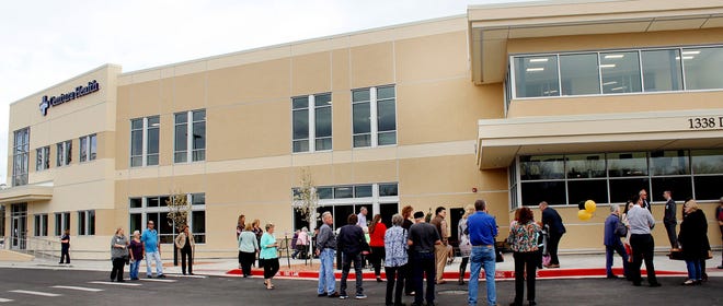 CHIEFTAIN PHOTO/TRACY HARMON Residents gather for the grand opening at the new $10 million St. Thomas More Hospital medical office building in Canon City Thursday.