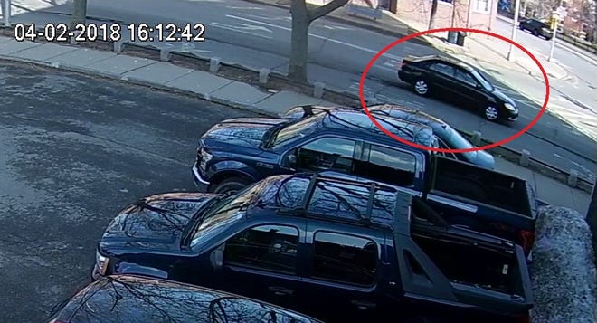 Dover Police released this image of the black car they say hit a 37-year-old pedestrian crossing Central Avenue downtown on April 2 and then fleeing the scene. They are seeking the public's help in identifying the car. [Dover Police/Courtesy]