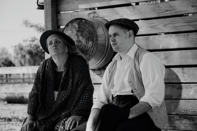 Martha Maggio, left, as Ma Joad and Jeremy Guerrero as Tom Joad in the Venice Theatre production of "The Grapes of Wrath," based on the John Steinbeck novel. 

[Venice Theatre photo / Sean Priest]