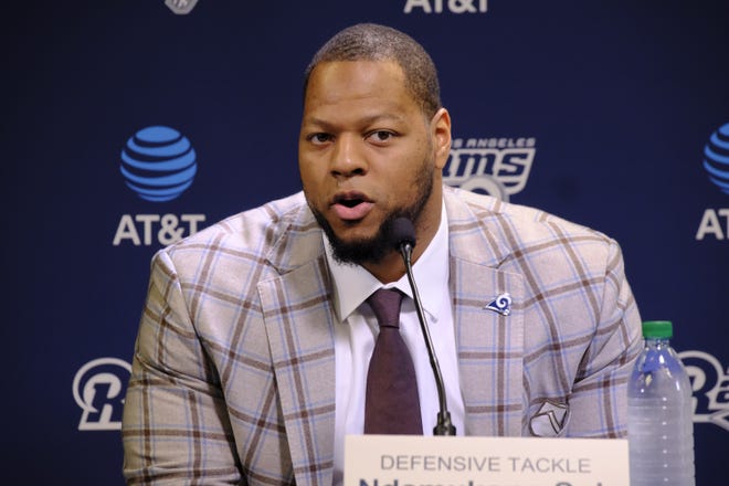 Los Angeles Rams new defensive tackle Ndamukong Suh answers questions during a news conference at the team's practice facility in Thousand Oaks, Calif., on Friday. [AP Photo / Richard Vogel]