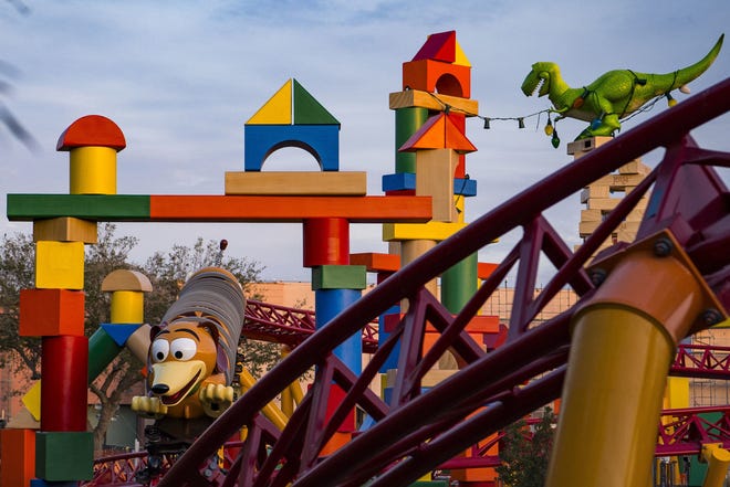 The 11-acre Toy Story Land will include a family-friendly roller coaster, Slinky Dog Dash (pictured under development) as well as the Alien Swirling Saucers, among other attractions. [Matt Stroshane/Walt Disney World/PRNewsfoto]