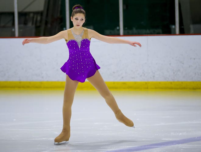 Hailey Masse, 13, of Noble Junior High School performs at the Great Bay Figure Skating Club's spring ice show Saturday at the Dover Ice Arena. [Shawn St. Hilaire/Fosters.com]