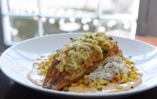 Harry's Seafood Bar and Grille's Crab Crusted Red Fish Royale. [CHRISTINA KELSO/THE RECORD]