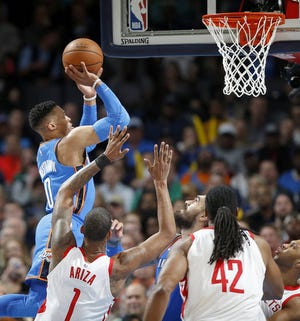 Oklahoma City's Russell Westbrook (0) goes to the basket during an NBA basketball game between the Oklahoma City Thunder and the Houston Rockets at Chesapeake Energy Arena in Oklahoma City, Tuesday, March 6, 2018. Photo by Bryan Terry, The Oklahoman